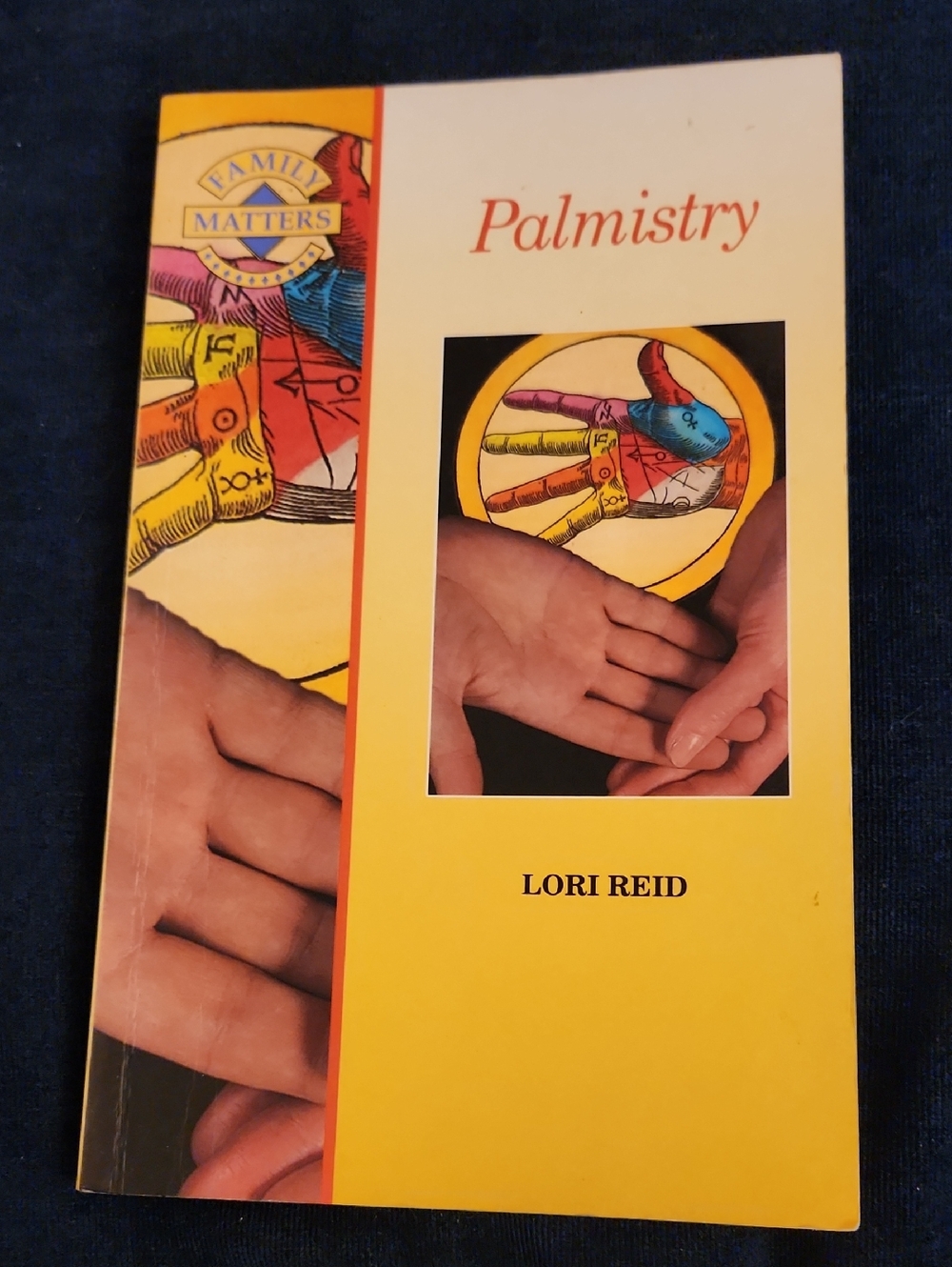 Palmistry by Lori Reid - Yellow Paperback Book